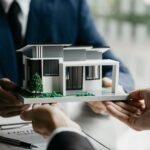 Real estate agents are carrying a housing model of the project.