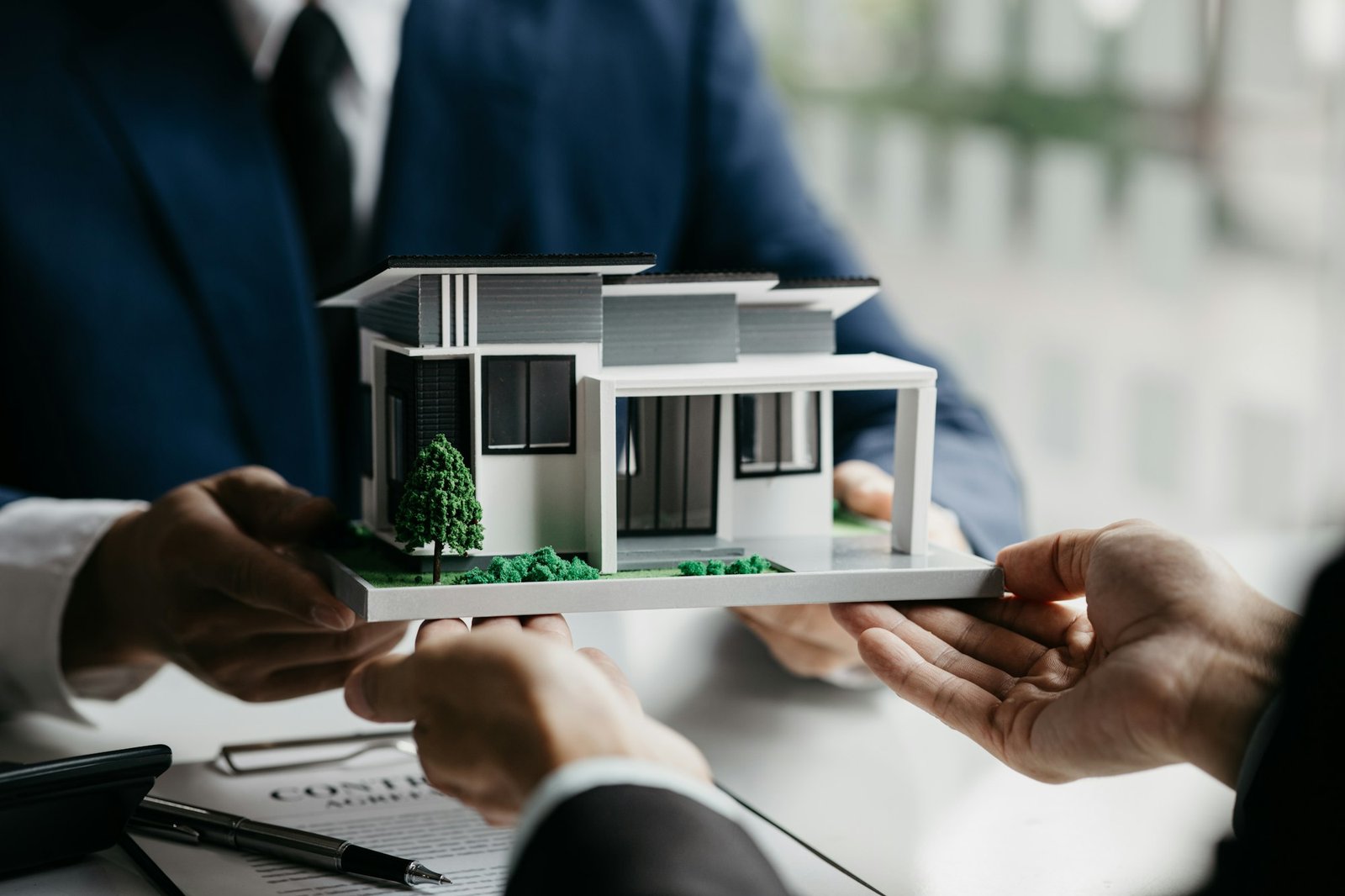 Real estate agents are carrying a housing model of the project.